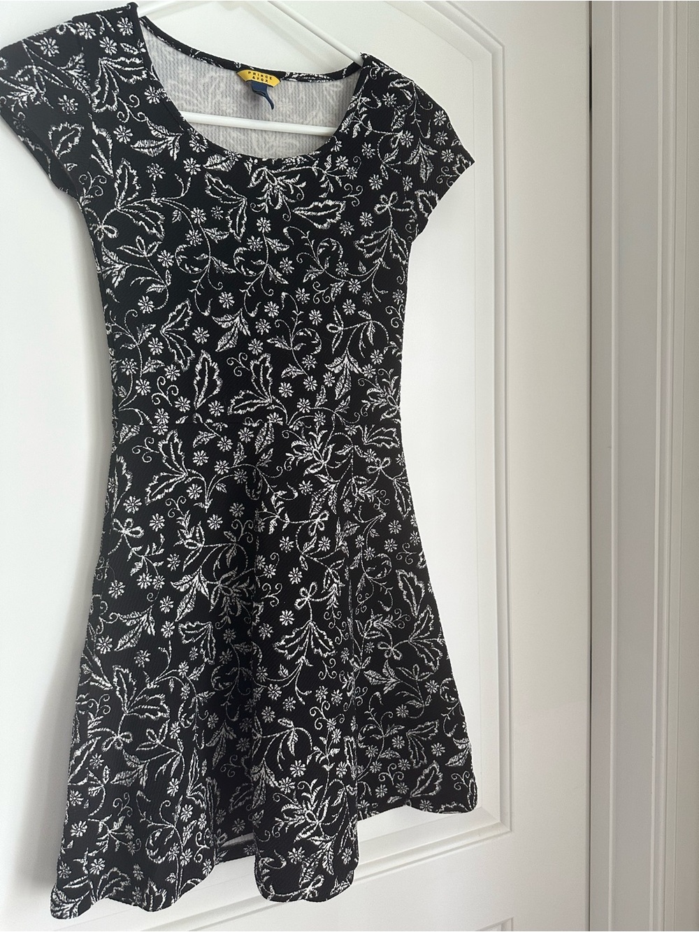 Prince & Fox Black Mini Dress with White Floral Pattern